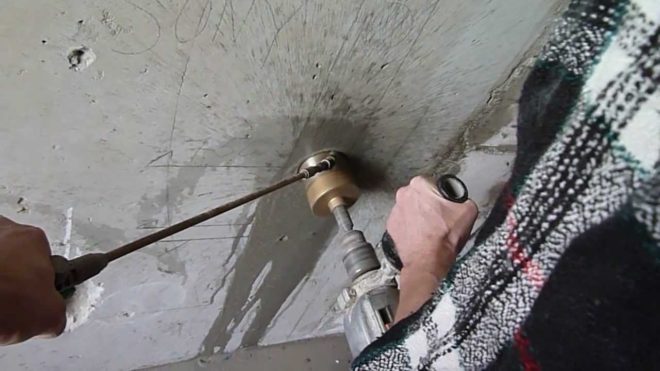 drilling a hole for a socket in concrete