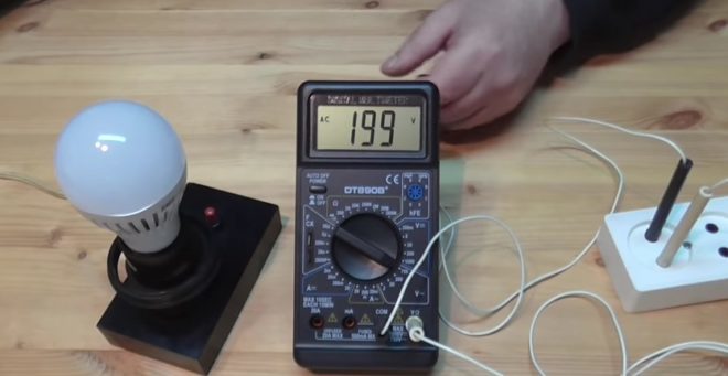 Checking a light bulb with a multimeter